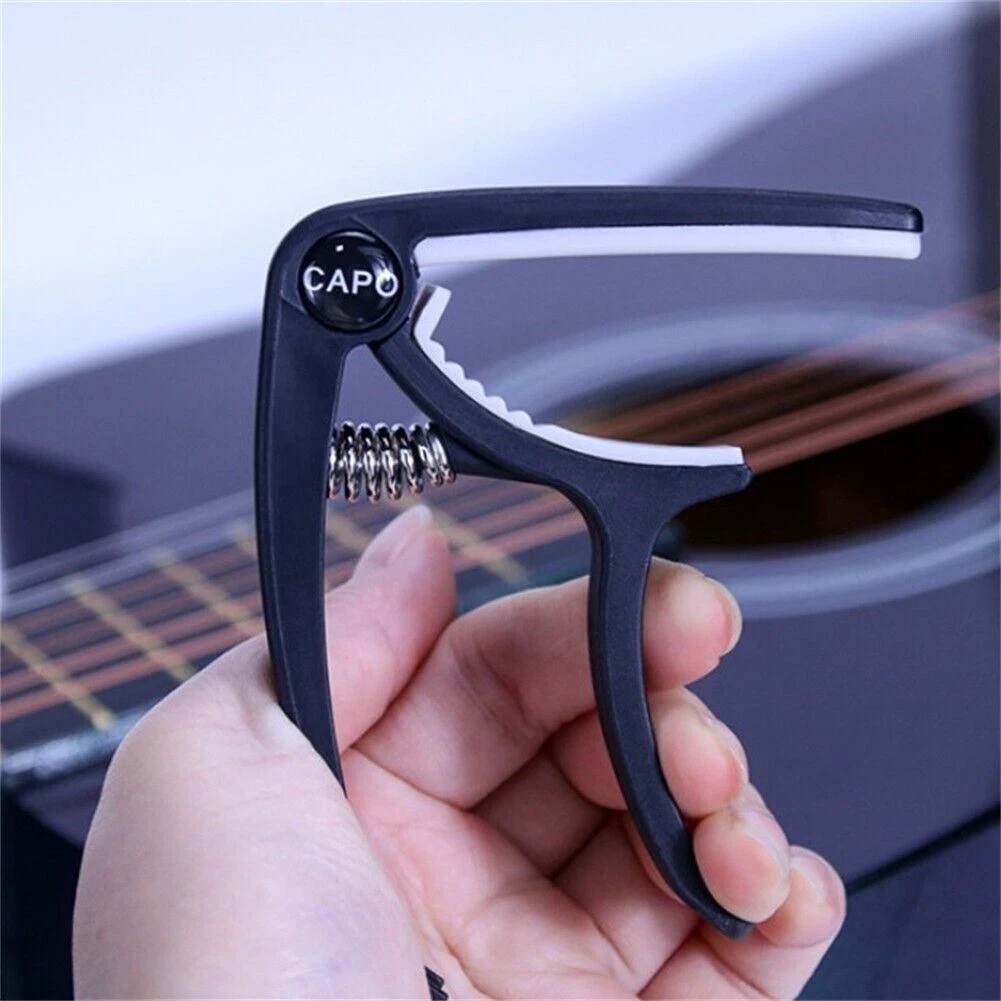 1PCS Universal Guitar Capo Tri - огляд і ціна Guitar Capo Clip