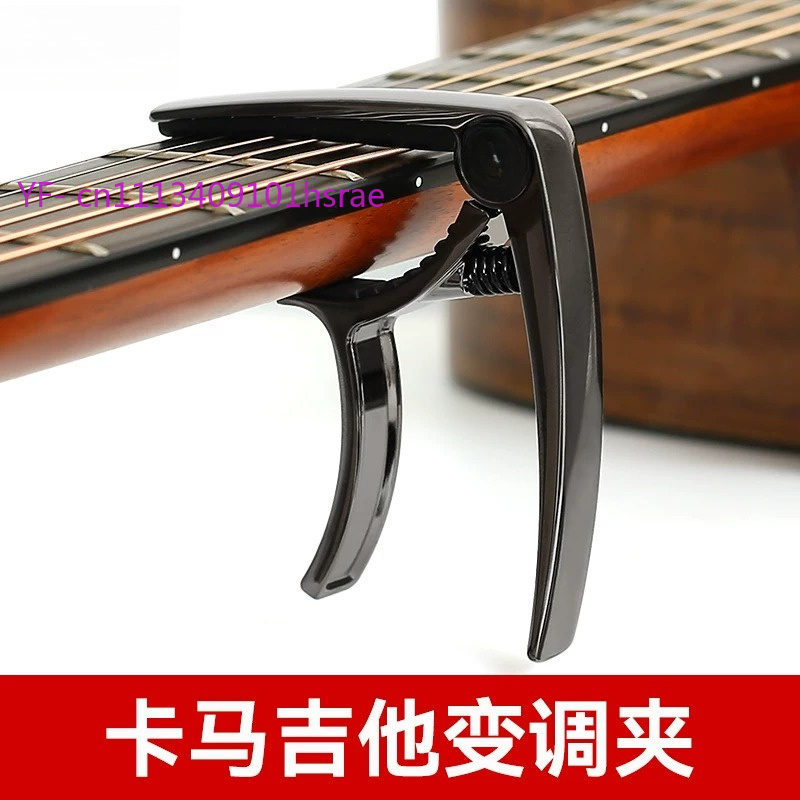 Capo, Bakelite & Acoustic Guit - огляд і ціна Guitar Capo Clip