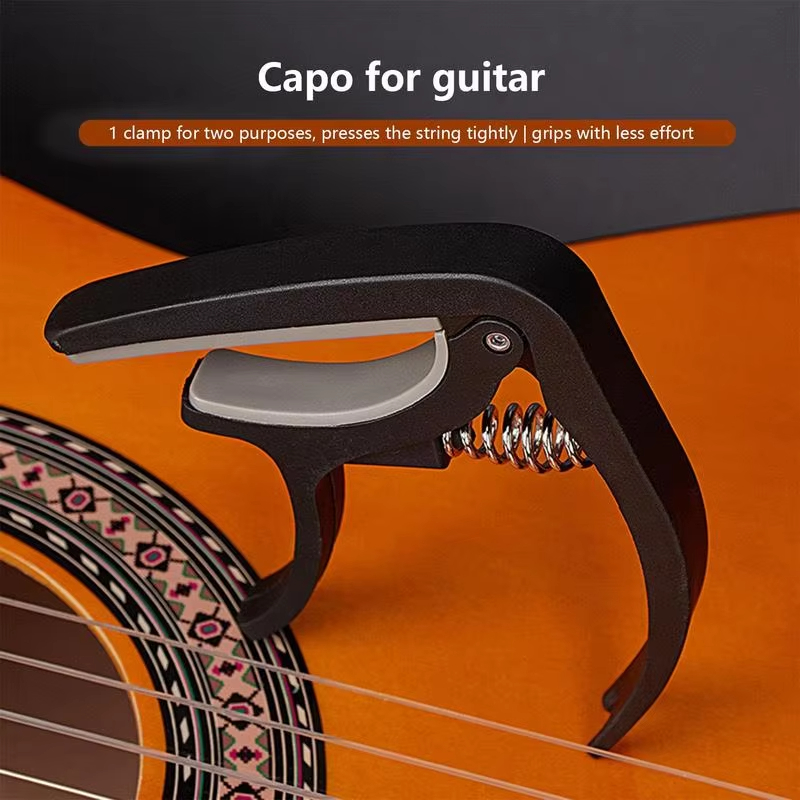 Portable Plastic Guitar Capo F - огляд і ціна Guitar Capo Clip