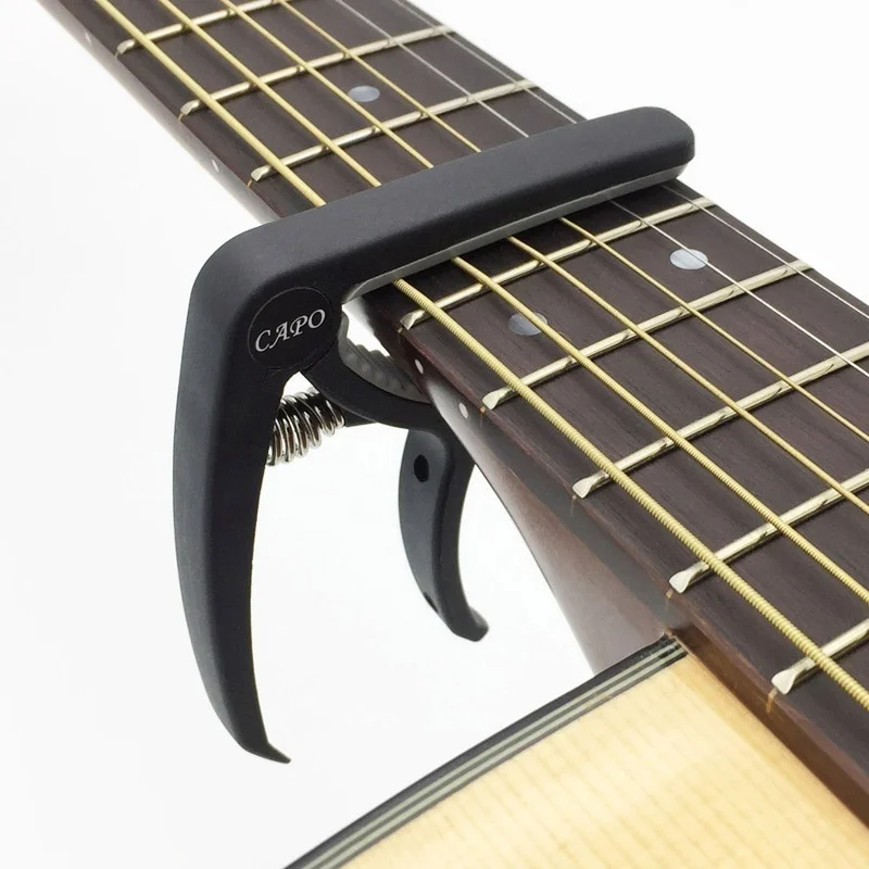 Plastic Guitar Capo for 6 Stri - огляд і ціна Guitar Capo Clip