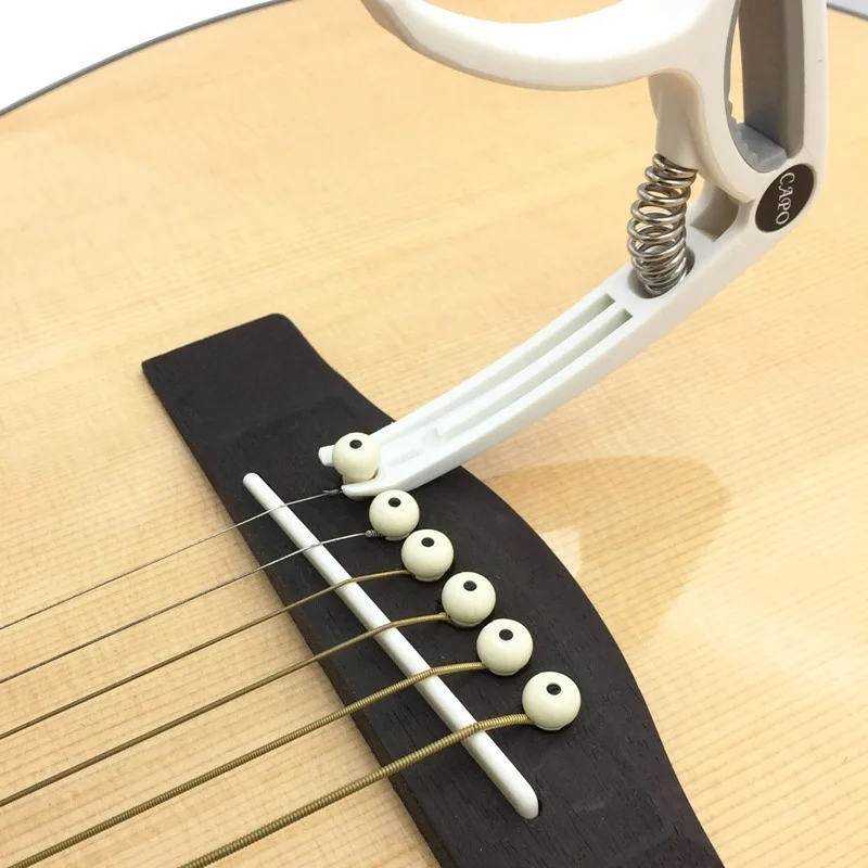 Plastic Guitar Capo for 6 Stri - огляд і ціна Guitar Capo Clip